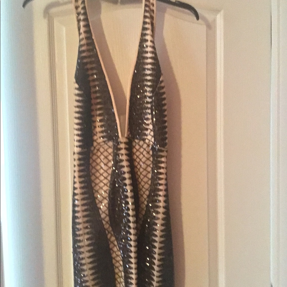 Sexy halter/backless cocktail dress with sequins.